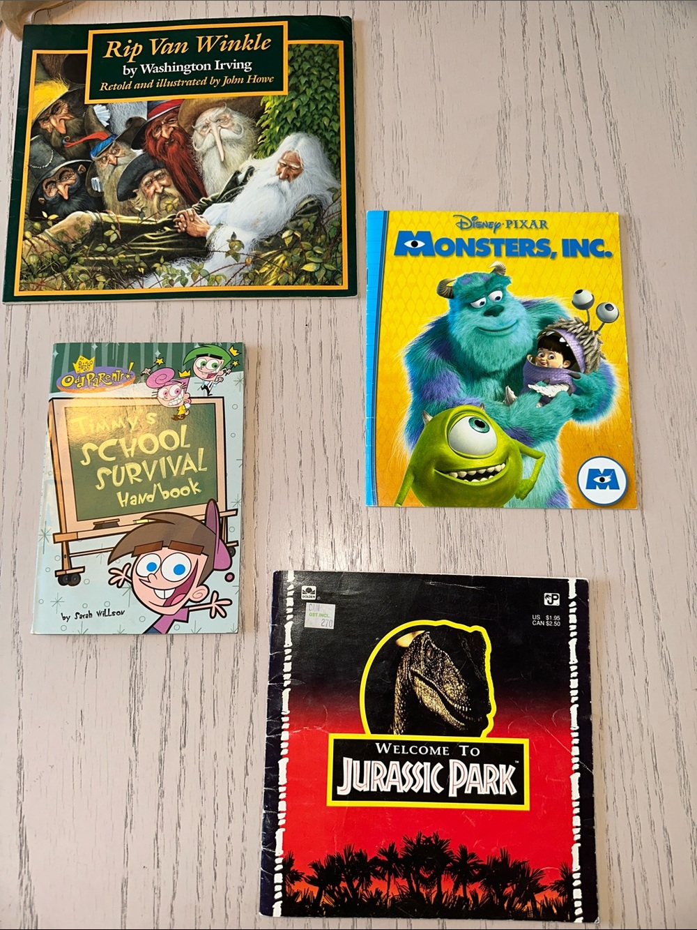 Set of 4 books jurassic park monsters inc. Rip van winkle